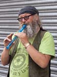 A Busker with a Recorder